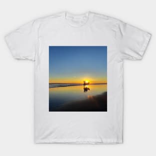 A silhouetted horse-drawn carriage on Parangtritis beach at sunset 4 T-Shirt